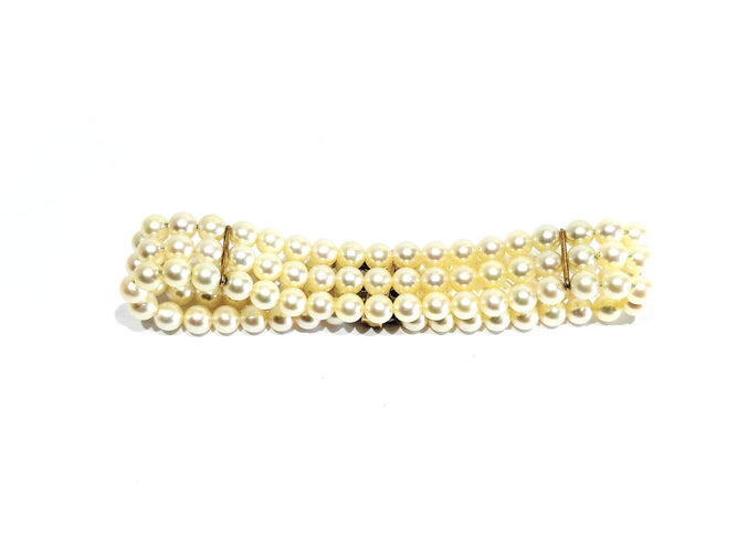 Bracelet en or jaune 18 carats et perles de culture 58 Facettes 1794592