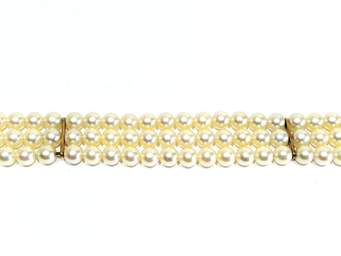 Bracelet en or jaune 18 carats et perles de culture 58 Facettes 1794592