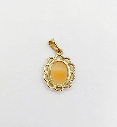 Pendentif vintage en or 18k et camée coquille 58 Facettes A07571