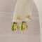 Boucles d'oreilles Green Radiance - Parure en or jaune 14 kt, péridots et diamants 58 Facettes S001