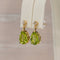 Boucles d'oreilles Green Radiance - Parure en or jaune 14 kt, péridots et diamants 58 Facettes S001