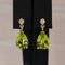 Boucles d'oreilles Green Radiance - Parure en or jaune 14 kt, péridots et diamants 58 Facettes S001