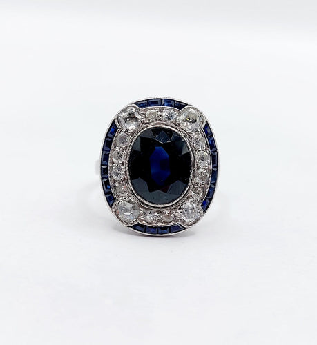 50 Bague pompadour Art déco en or blanc, saphir et diamants 58 Facettes A07580