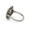 54 Bague marguerite en or blanc, diamants et saphir 58 Facettes SA029