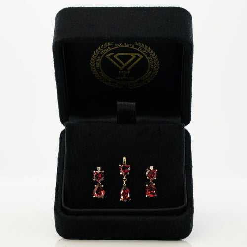Boucles d'oreilles Parure boucles d’oreilles et pendentif en or jaune, grenats et diamants 58 Facettes S002