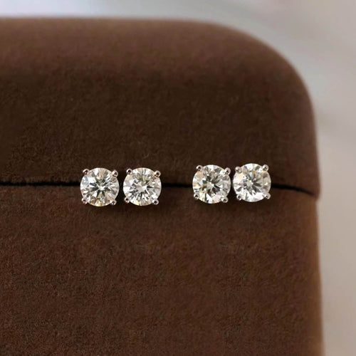 Embrace - Boucles d'oreilles solitaire en or blanc et diamants 58 Facettes GER1008WG