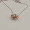 Collier cœur en or jaune et blanc avec brillants 58 Facettes 2909737