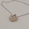 Collier cœur en or jaune et blanc avec brillants 58 Facettes 2909737