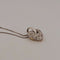 Collier cœur en or jaune et blanc avec brillants 58 Facettes 2909737