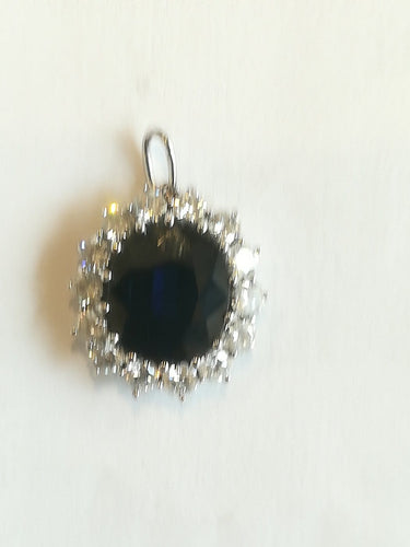 Pendentif marguerite en or blanc, saphir et diamants 58 Facettes 01375