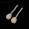 Boucles d'oreilles poire en or blanc 18K et diamants jaunes 58 Facettes GER1344WG