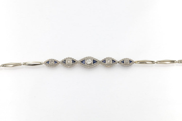 Bracelet géométrique en or jaune et blanc, diamants et saphirs 58 Facettes 13414