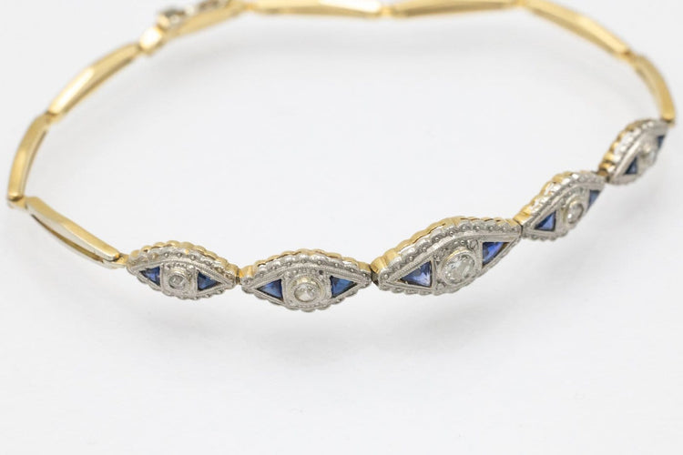 Bracelet géométrique en or jaune et blanc, diamants et saphirs 58 Facettes 13414
