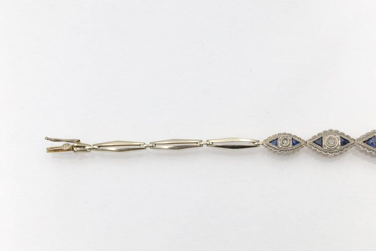 Bracelet géométrique en or jaune et blanc, diamants et saphirs 58 Facettes 13414