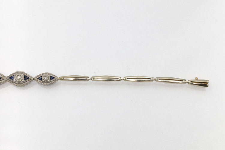 Bracelet géométrique en or jaune et blanc, diamants et saphirs 58 Facettes 13414