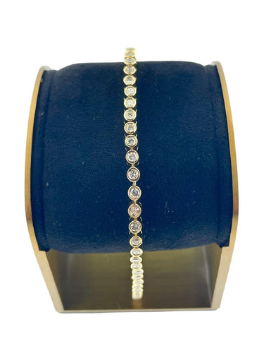 Bracelet tennis en or jaune 18 carats et diamants 58 Facettes BR1572