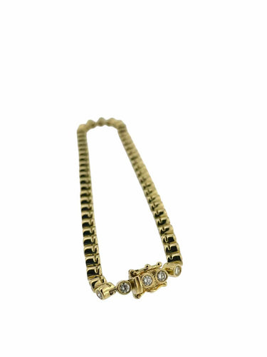Bracelet tennis en or jaune 18 carats et diamants 58 Facettes BR1572