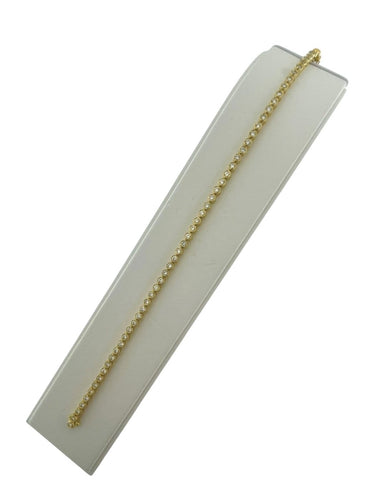 Bracelet tennis en or jaune 18 carats et diamants 58 Facettes BR1572