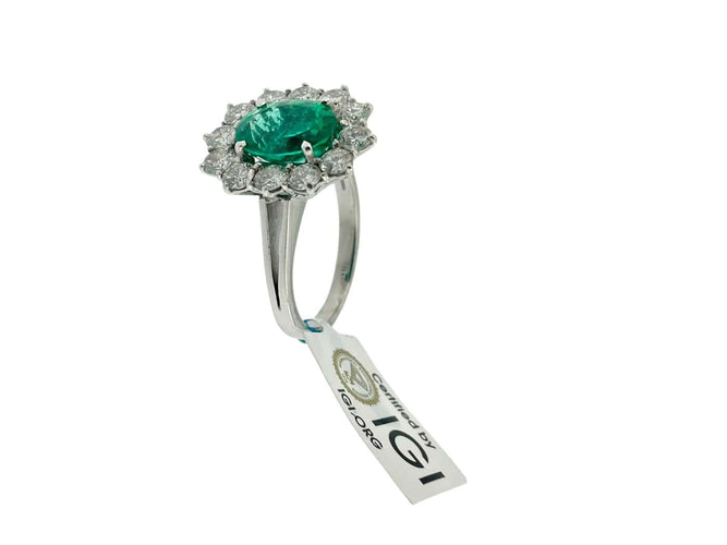 55 Bague Halo en or blanc avec émeraude et diamants 58 Facettes A2084