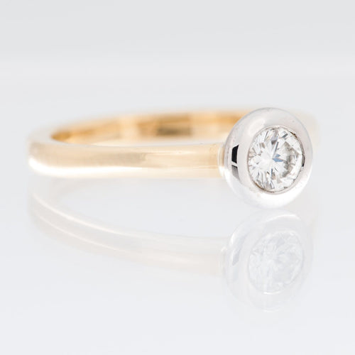 54 Bague solitaire HRD en or jaune et blanc avec diamant 58 Facettes A1909