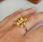 Bague 56.5 Bague cocktail vintage en or rose 18 carats et citrine 58 Facettes 681