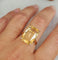 56.5 Bague cocktail vintage en or rose 18 carats et citrine 58 Facettes 681