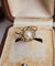 53 Bague en or jaune avec perle et diamants 58 Facettes 739