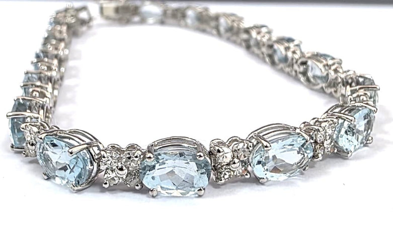 Bracelet Bracelet tennis en or blanc 18 ct avec aigue-marine et diamants 58 Facettes 451/26 D