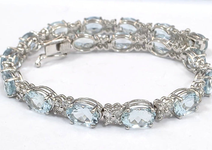 Bracelet tennis en or blanc 18 ct avec aigue-marine et diamants 58 Facettes 451/26 D