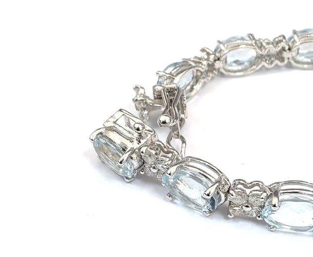Bracelet tennis en or blanc 18 ct avec aigue-marine et diamants 58 Facettes 451/26 D