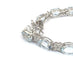 Bracelet tennis en or blanc 18 ct avec aigue-marine et diamants 58 Facettes 451/26 D