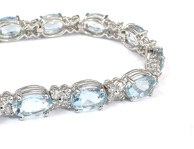 Bracelet tennis en or blanc 18 ct avec aigue-marine et diamants 58 Facettes 451/26 D