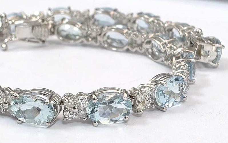 Bracelet tennis en or blanc 18 ct avec aigue-marine et diamants 58 Facettes 451/26 D