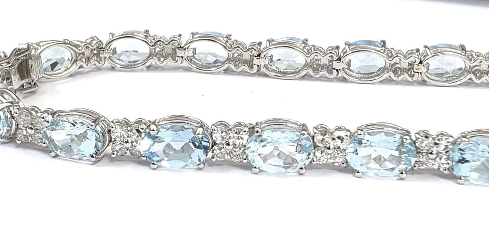 Bracelet tennis en or blanc 18 ct avec aigue-marine et diamants 58 Facettes 451/26 D