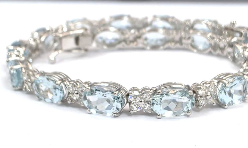 Bracelet tennis en or blanc 18 ct avec aigue-marine et diamants 58 Facettes 451/26 D