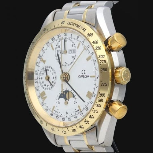 Omega Speedmaster - Montre Day Date automatique en or jaune et acier 58 Facettes MT47403