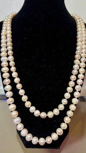 Sautoir 145 perles de culture d'eau douce, 120 cm 58 Facettes 889