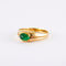 60 Bague jonc en or jaune et émeraude 58 Facettes Bague