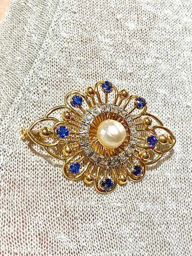 Broche en or jaune avec saphirs, diamants et perle 58 Facettes AB736