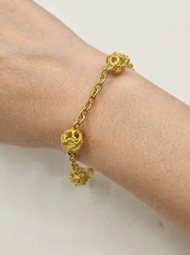 Bracelet motif nœud vintage en or jaune 18 ct 58 Facettes CV-092