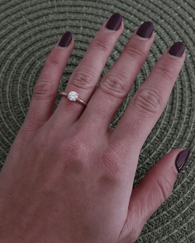 48 Cartier 1895 - Bague solitaire en or jaune et diamant 58 Facettes Cartier YG