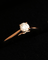 48 Cartier 1895 - Bague solitaire en or jaune et diamant 58 Facettes Cartier YG