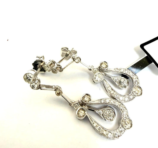 Boucles d'oreilles en or blanc et diamants 58 Facettes 296/26 H