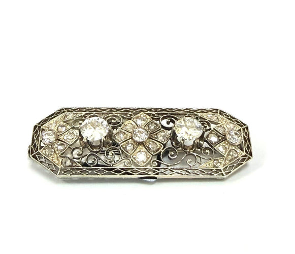 Broche en or blanc 18 ct et diamants 58 Facettes 773 F OC
