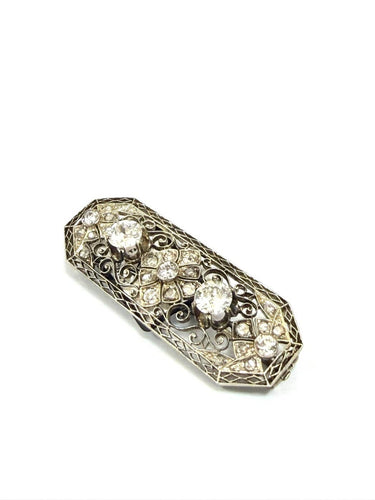 Broche en or blanc 18 ct et diamants 58 Facettes 773 F OC