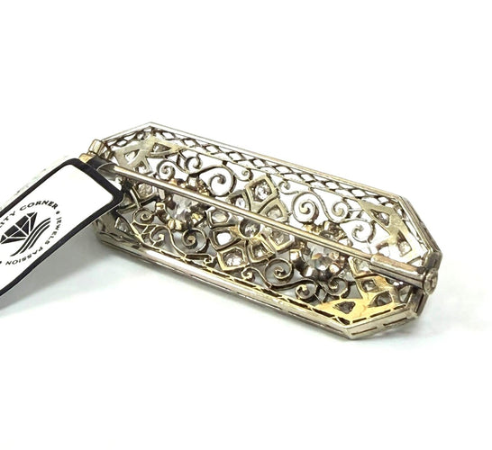Broche en or blanc 18 ct et diamants 58 Facettes 773 F OC