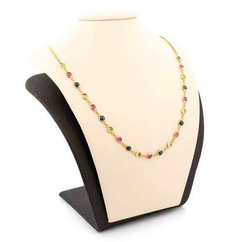 Collier vintage en or jaune 18k, péridots, rubis et saphirs 58 Facettes A88D477A9A6345D7AF89296001F8C42A