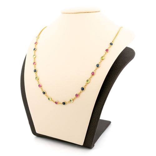 Collier vintage en or jaune 18k, péridots, rubis et saphirs 58 Facettes A88D477A9A6345D7AF89296001F8C42A