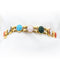 Bracelet vintage en or 18 carats avec camées et pierres dures 58 Facettes 113T20_M