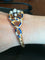 Bracelet ancien en or jaune, émail, perles et diamants 58 Facettes 01380